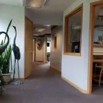  {PRÁCTICA_NOMBRE} pasillo del recorrido de la oficina